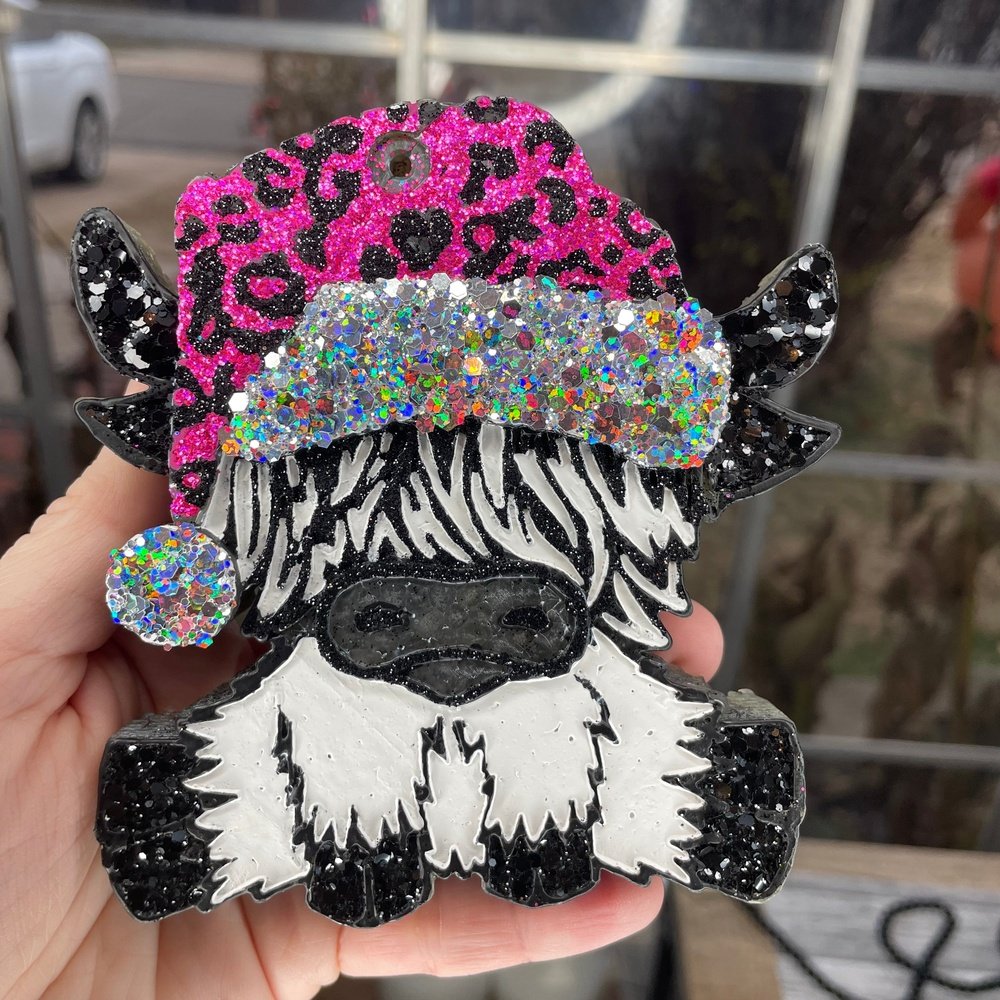 Cow w/ leopard Santa hat