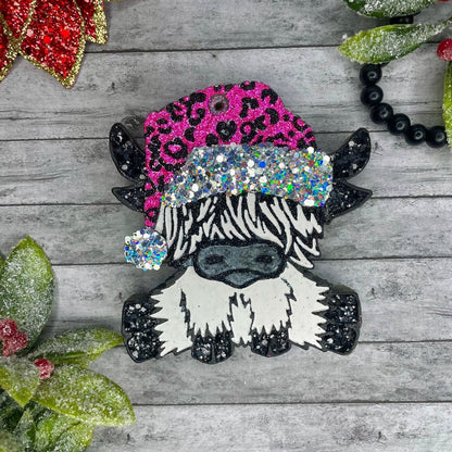 Cow w/ leopard Santa hat